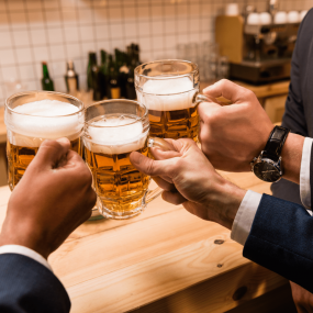 cropped-shot-of-businessmen-drinking-beer-together-2021-09-28-23-15-49-utc